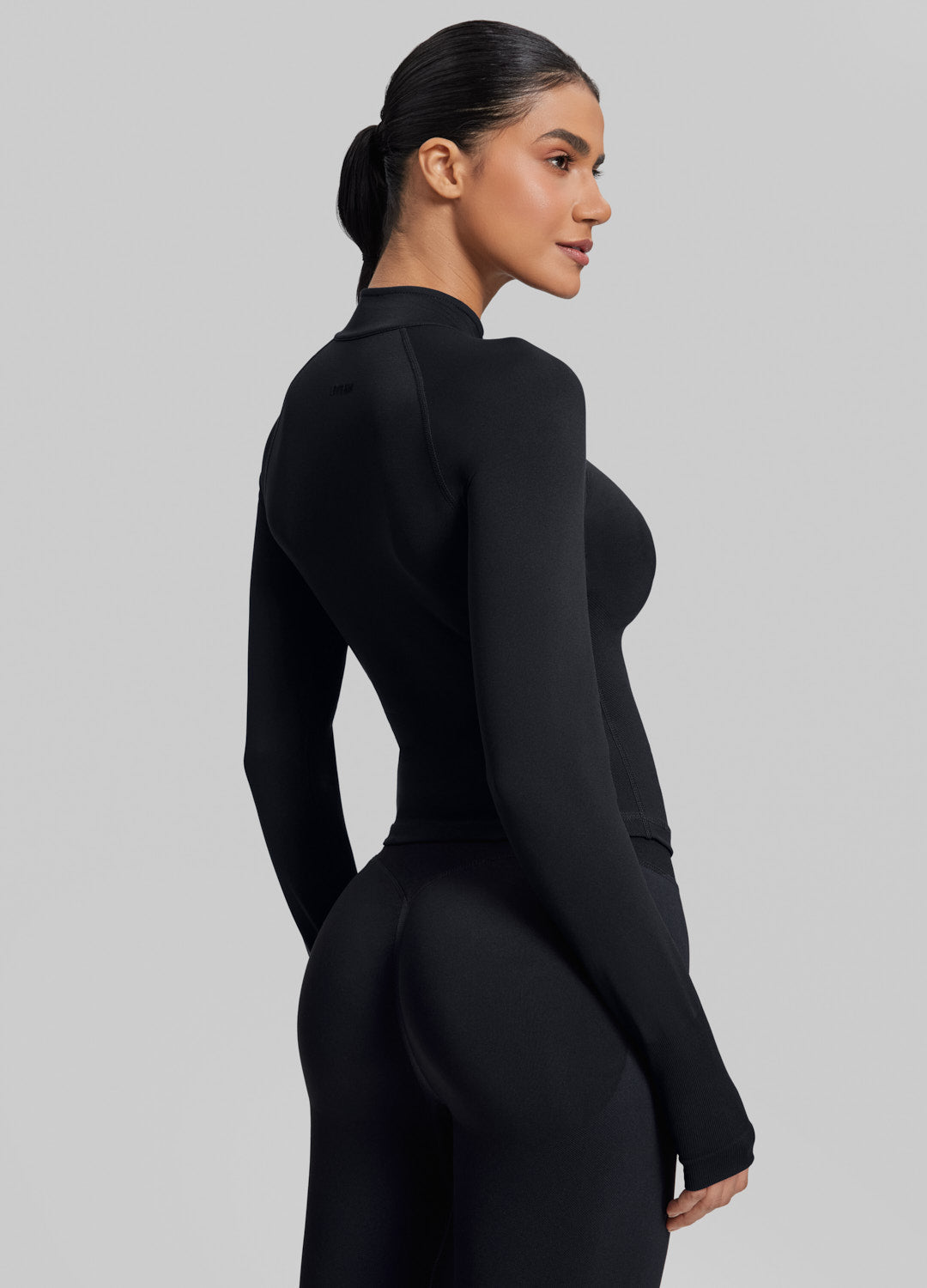 Ultrasculpt Longline Form-Fitting Seamless Thumb Hole Twill Knit Half-Zip Top - Image 2